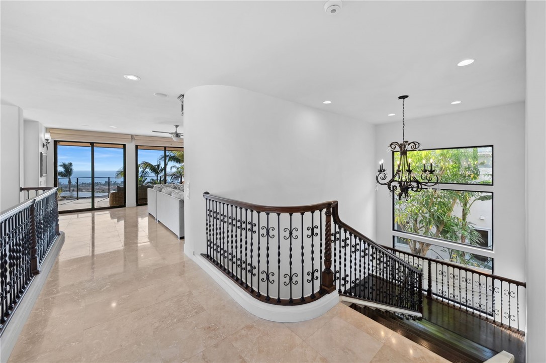 5381 Moonlight Lane La Jolla, CA 92037 - Photo 23 of 44 a view of a hallway with window