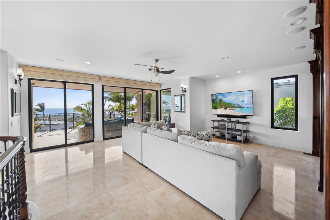 5381 Moonlight Lane La Jolla, CA 92037 - Photo 26 of 44 a living room with furniture and a large window