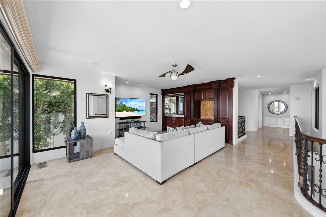 5381 Moonlight Lane La Jolla, CA 92037 - Photo 27 of 44 a living room with furniture and a large window