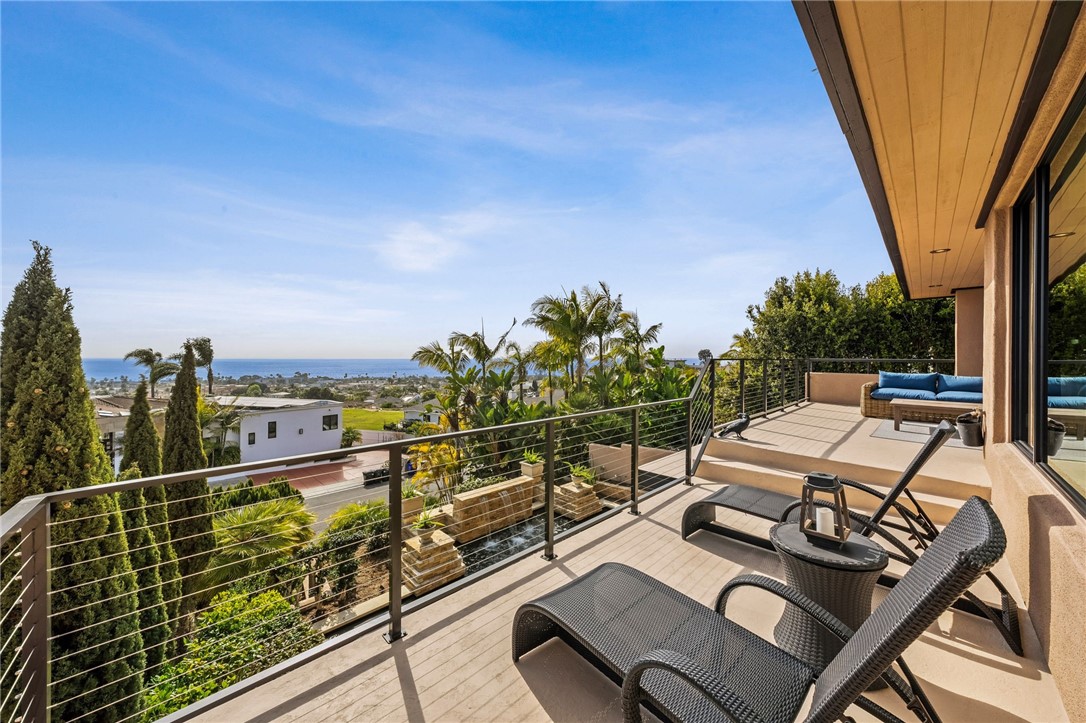 5381 Moonlight Lane La Jolla, CA 92037 - Photo 38 of 44 a view of a balcony with chairs