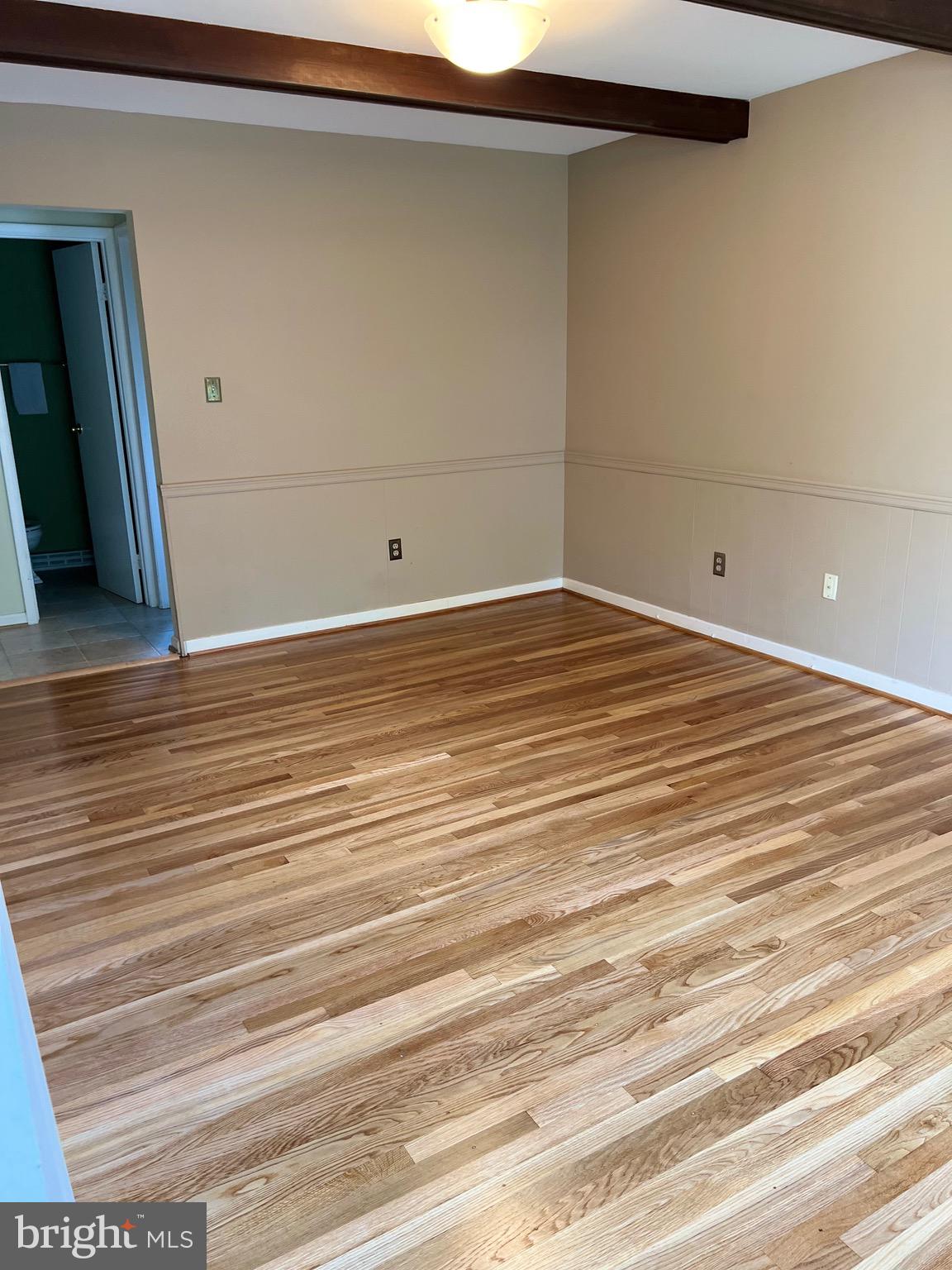 204 Pewter Lane Silver Spring, MD 20905 - Photo 10 of 12 a view of a livingroom with an empty space