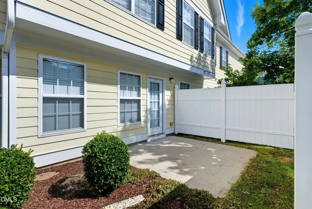 a view of a kitchen with wooden floor and a kitchen