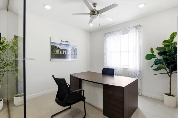 a view of a dining room with furniture