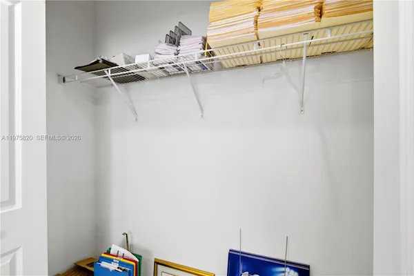 a view of a room with racks on the wall