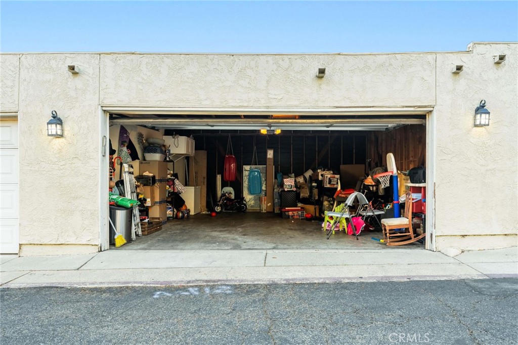 646 Sycamore Avenue, Unit 18 Claremont, CA 91711 - Photo 17 of 46 a view of a garage with rack and bicycle