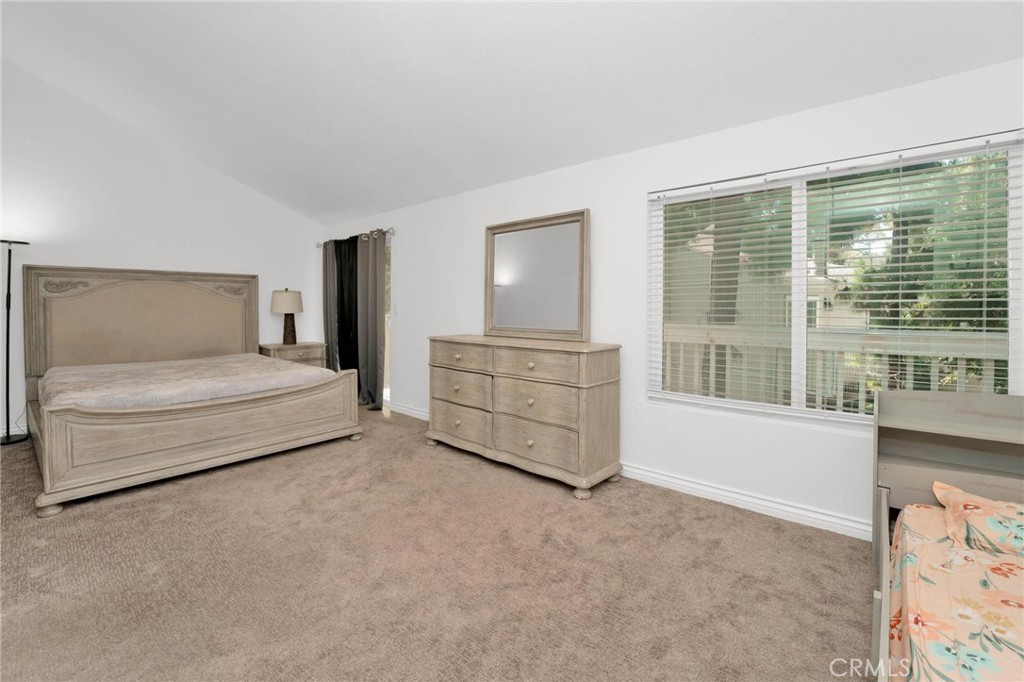 646 Sycamore Avenue, Unit 18 Claremont, CA 91711 - Photo 29 of 46 a living room with furniture and large windows