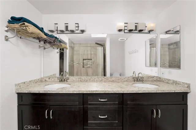 a bedroom with bed and a window