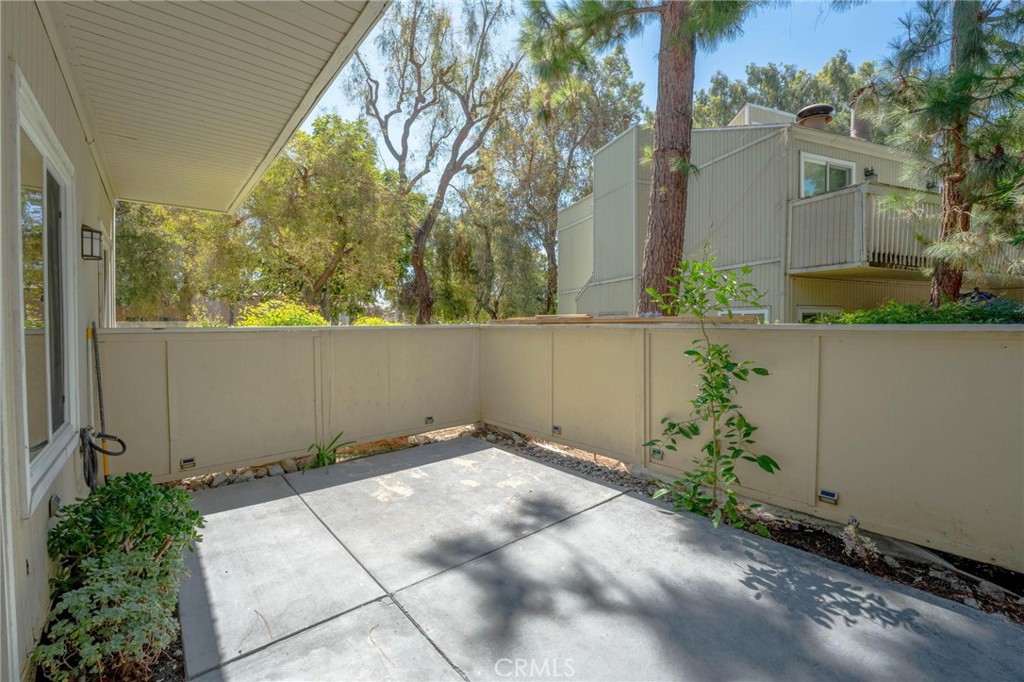 646 Sycamore Avenue, Unit 18 Claremont, CA 91711 - Photo 6 of 46 a view of backyard with plants and trees