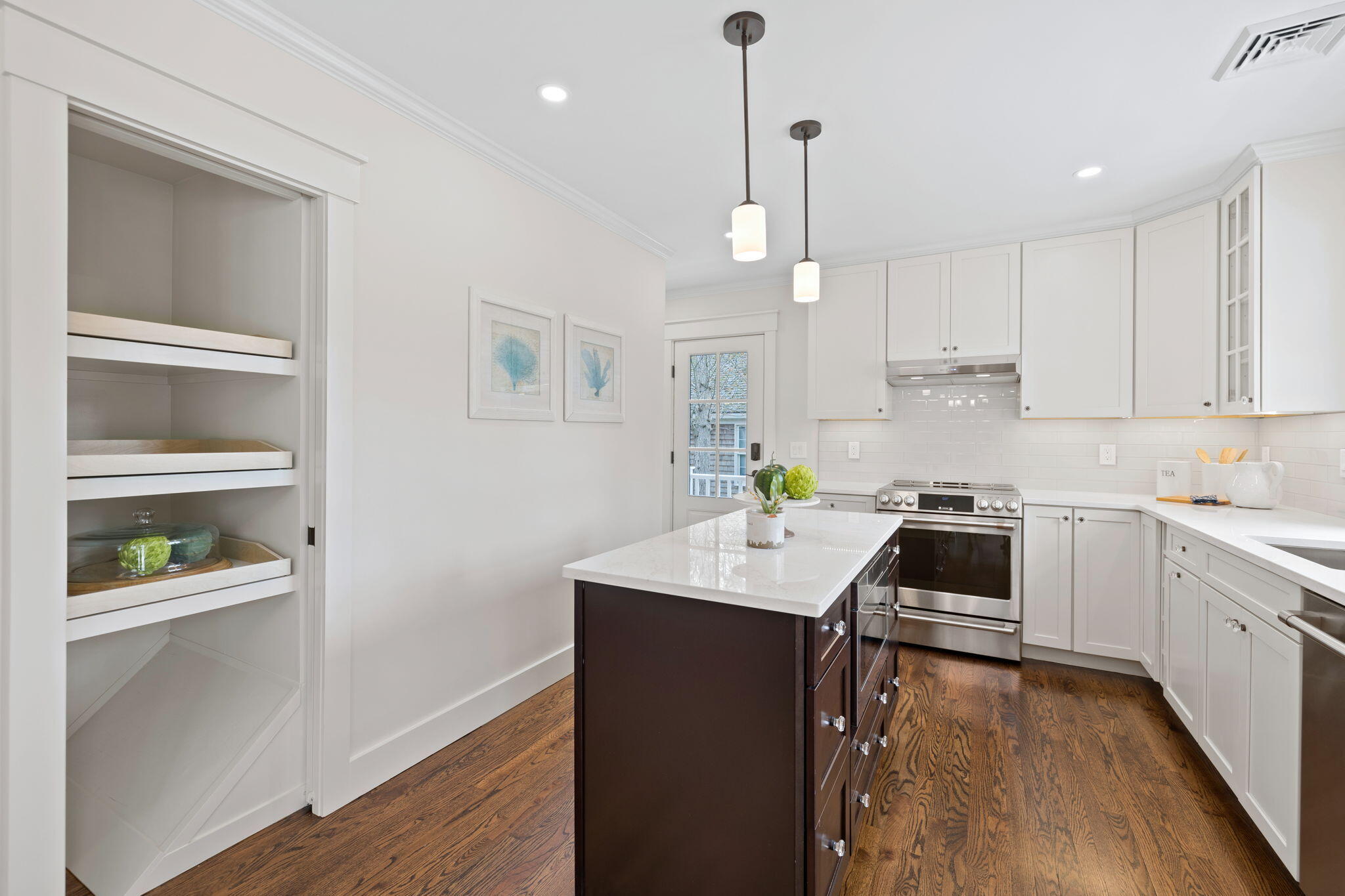 321 Tower Hill Road Osterville, MA 02655 - Photo 12 of 38 a kitchen with stainless steel appliances granite countertop a sink dishwasher a stove and a refrigerator with wooden floor