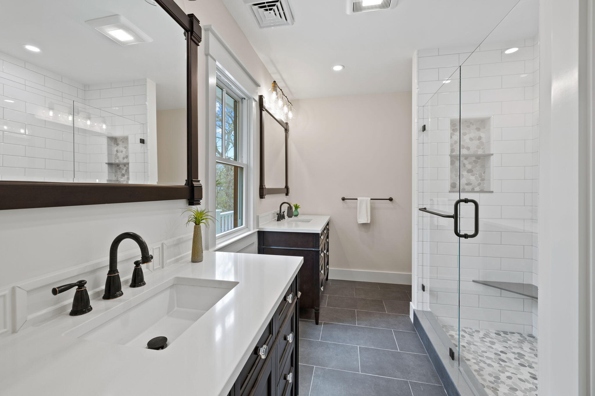 321 Tower Hill Road Osterville, MA 02655 - Photo 15 of 38 a bathroom with a double vanity sink a toilet and a mirror