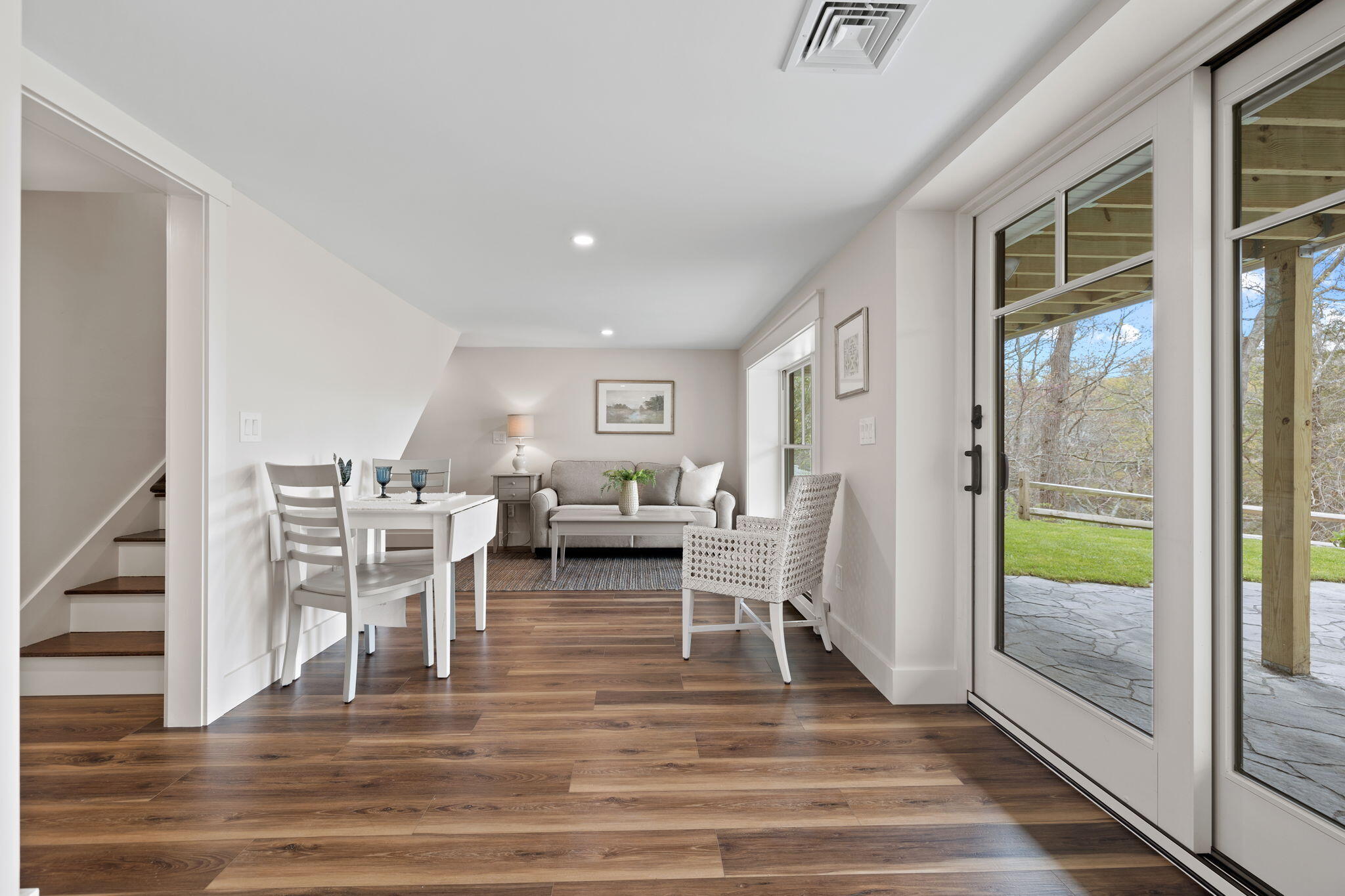 321 Tower Hill Road Osterville, MA 02655 - Photo 17 of 38 a living room with furniture and a fireplace