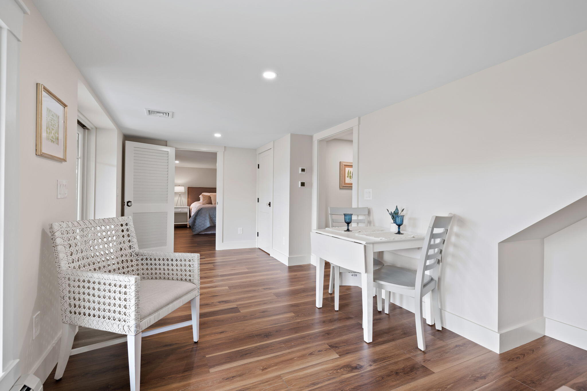 321 Tower Hill Road Osterville, MA 02655 - Photo 19 of 38 a dining room with furniture and wooden floor