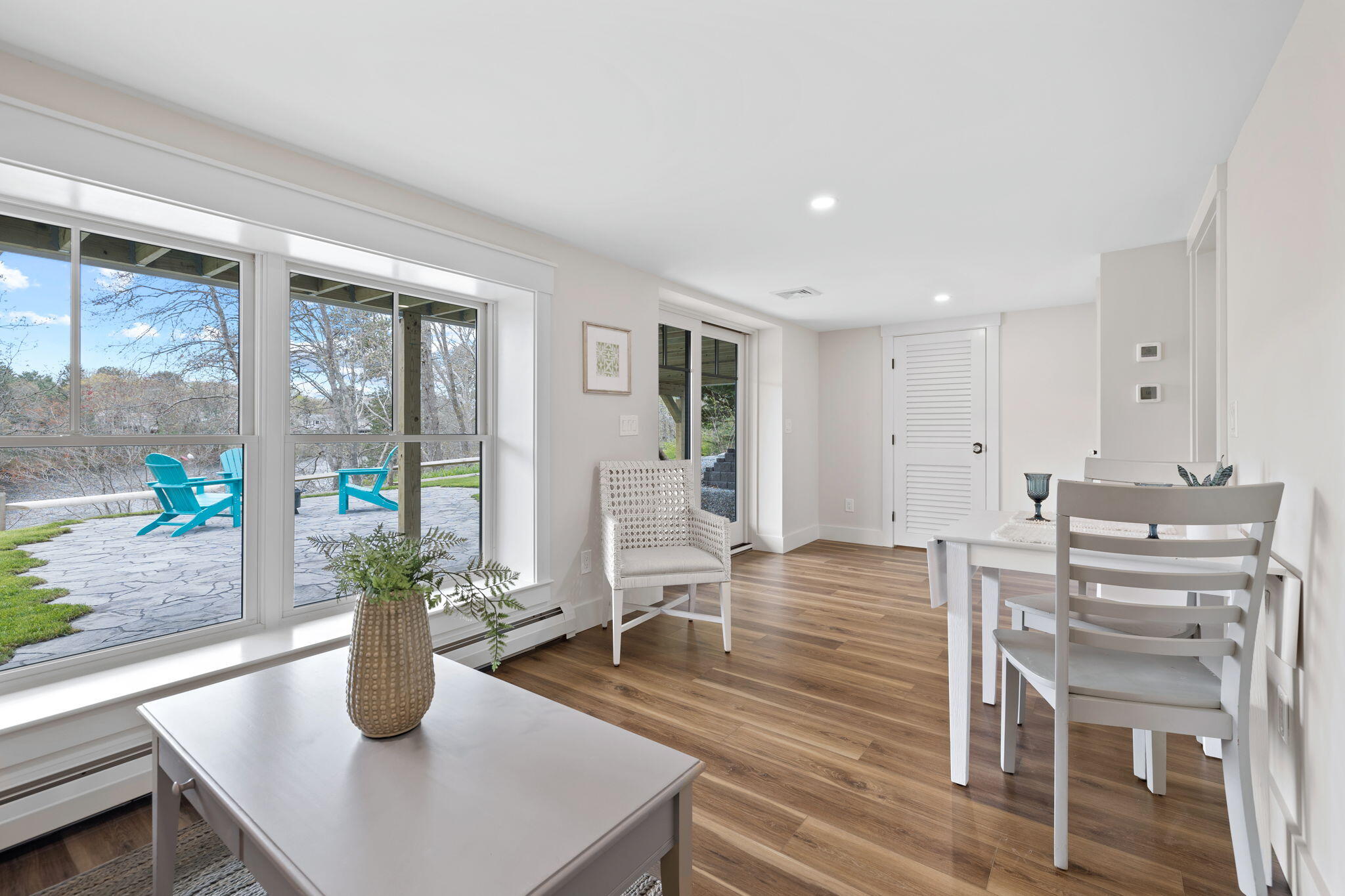 321 Tower Hill Road Osterville, MA 02655 - Photo 20 of 38 a view of a dining room with furniture window and wooden floor