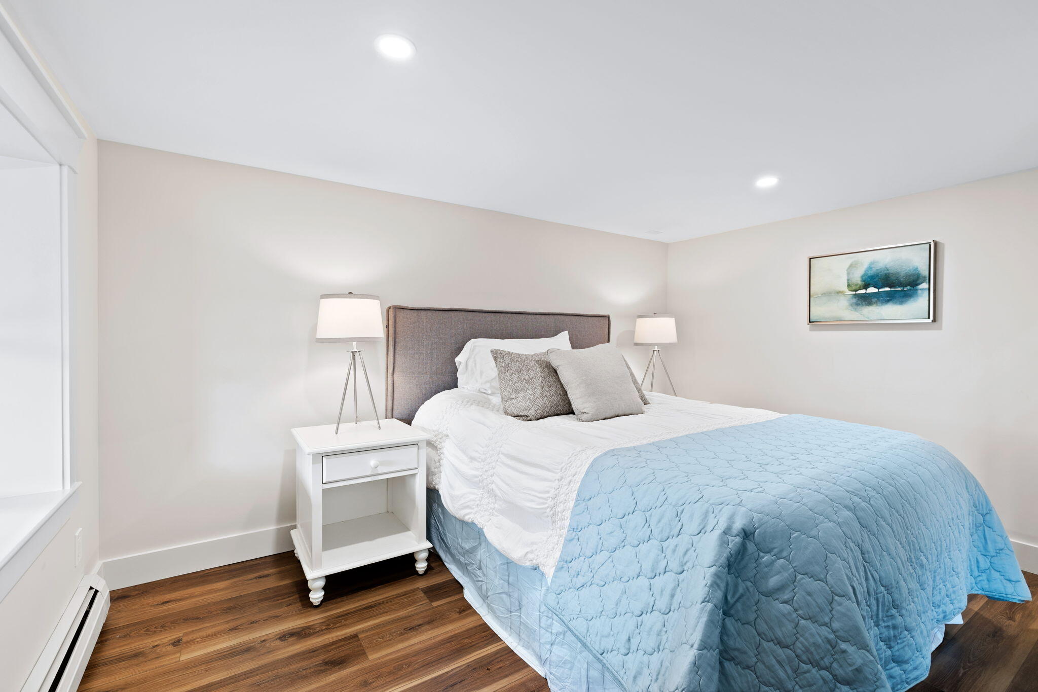 321 Tower Hill Road Osterville, MA 02655 - Photo 24 of 38 a bedroom with a bed and wooden floor