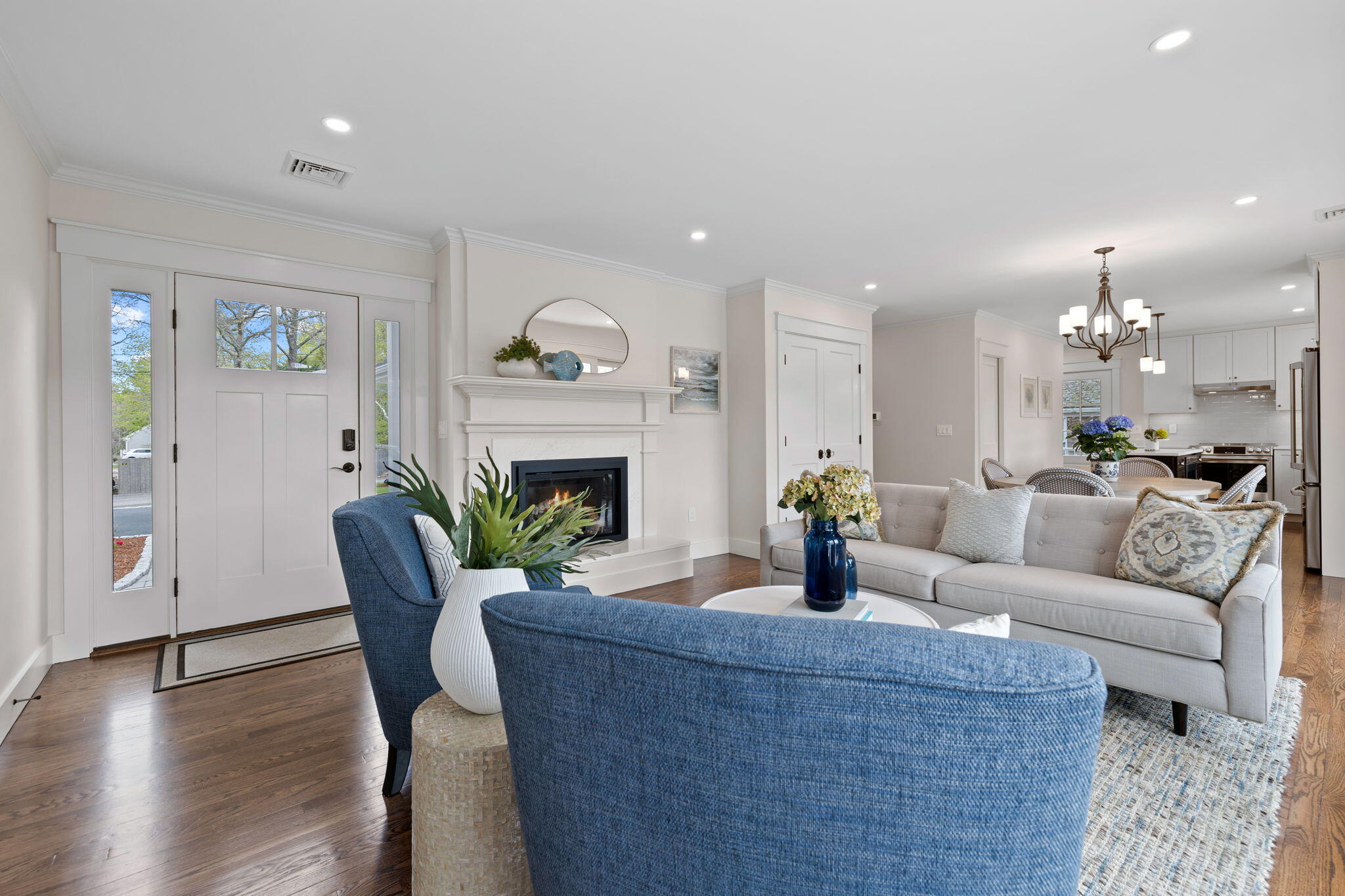 321 Tower Hill Road Osterville, MA 02655 - Photo 3 of 38 a living room with furniture and a fireplace