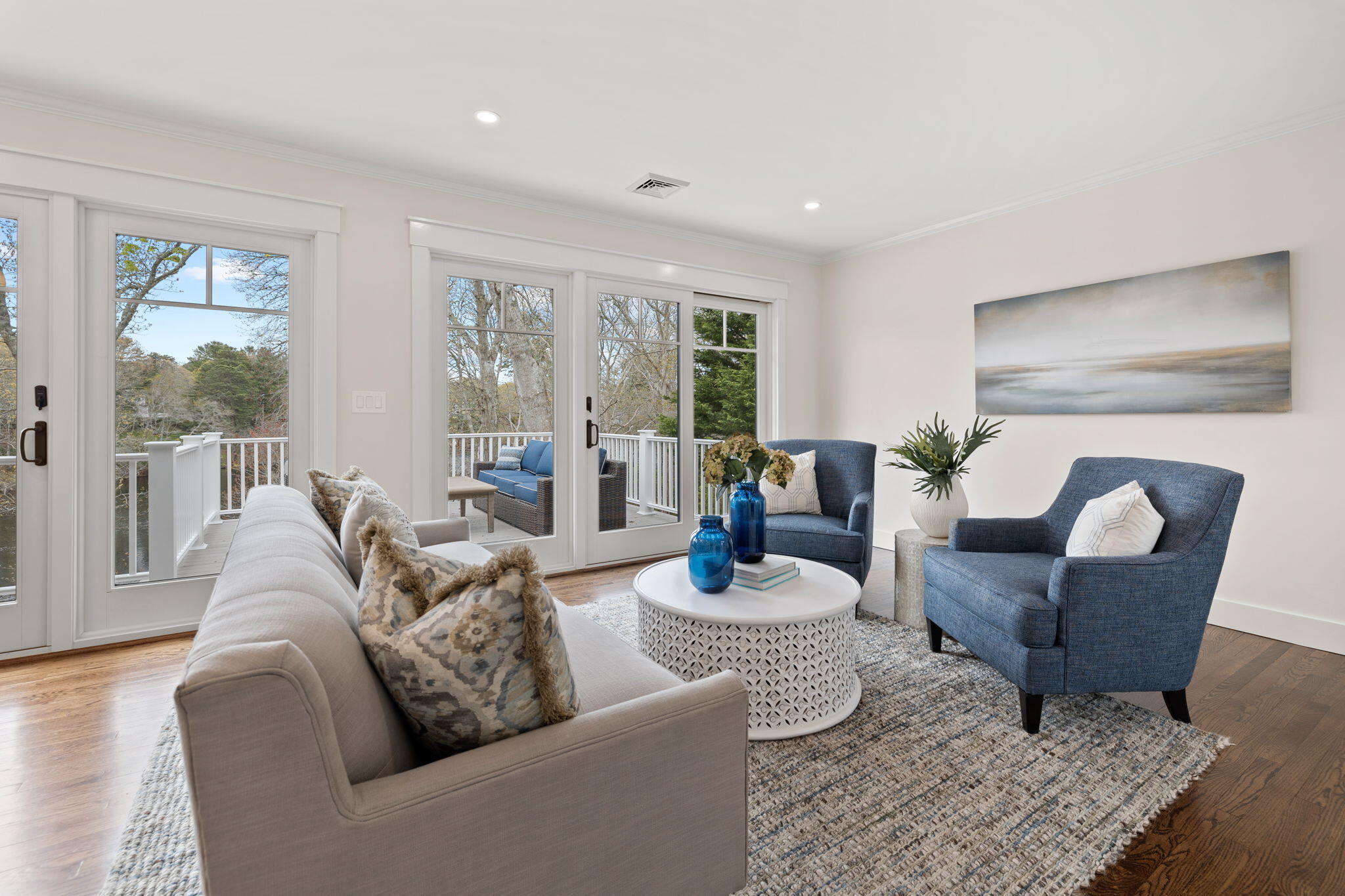 321 Tower Hill Road Osterville, MA 02655 - Photo 4 of 38 a living room with furniture and a large window