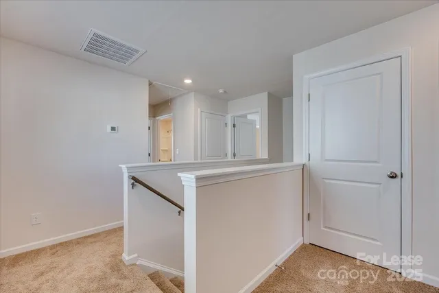 a view of kitchen and wooden floor
