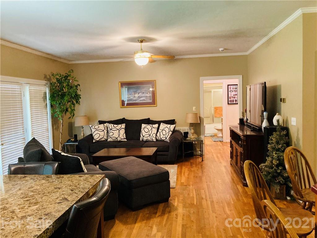 470 Duncard Church Road Rutherfordton, NC 28139 - Photo 2 of 43 a living room with furniture and a chandelier