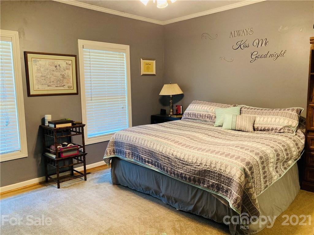 470 Duncard Church Road Rutherfordton, NC 28139 - Photo 11 of 43 a bedroom with a bed and a chair in it