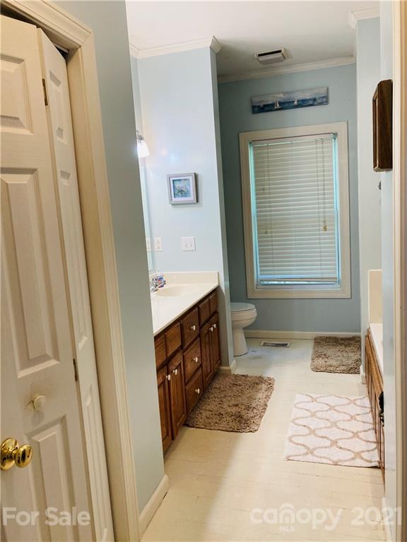 470 Duncard Church Road Rutherfordton, NC 28139 - Photo 13 of 43 a bathroom with a sink a mirror and a shower