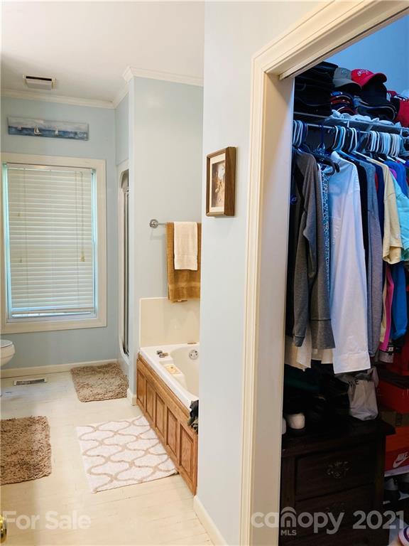 470 Duncard Church Road Rutherfordton, NC 28139 - Photo 14 of 43 a view of walk in closet with clothes and shoes