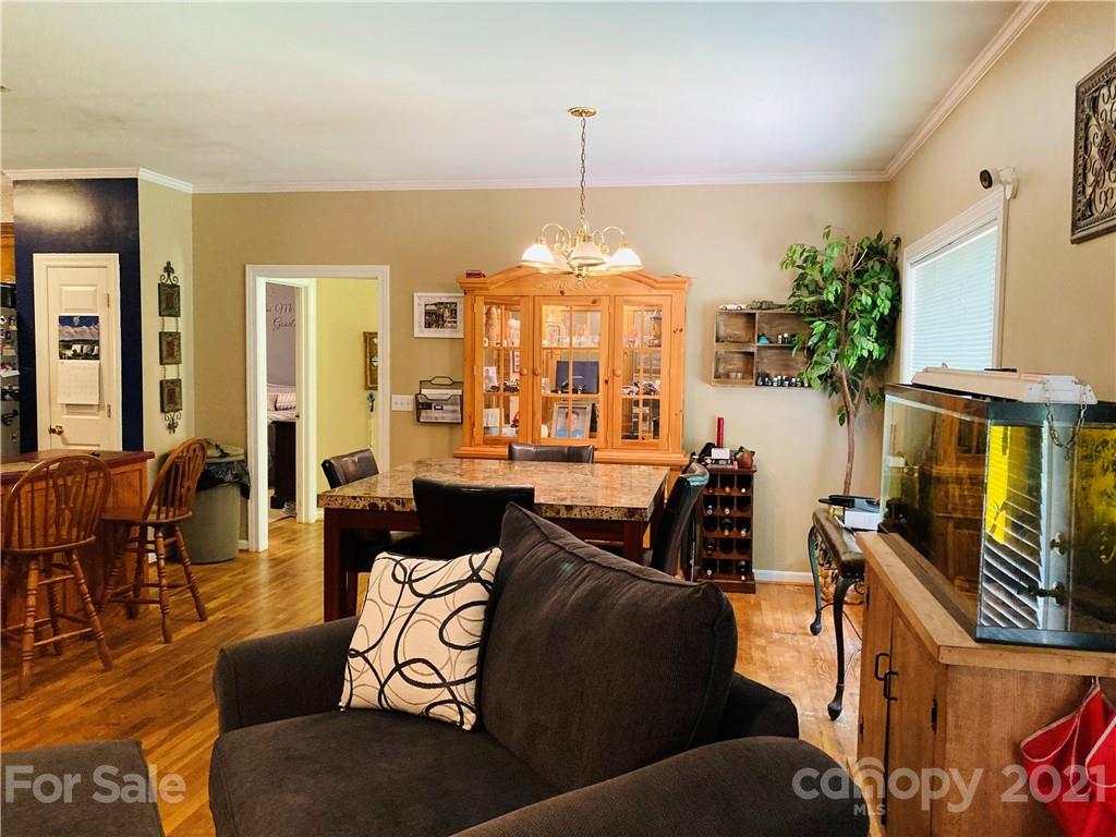 470 Duncard Church Road Rutherfordton, NC 28139 - Photo 3 of 43 a living room with furniture and a chandelier