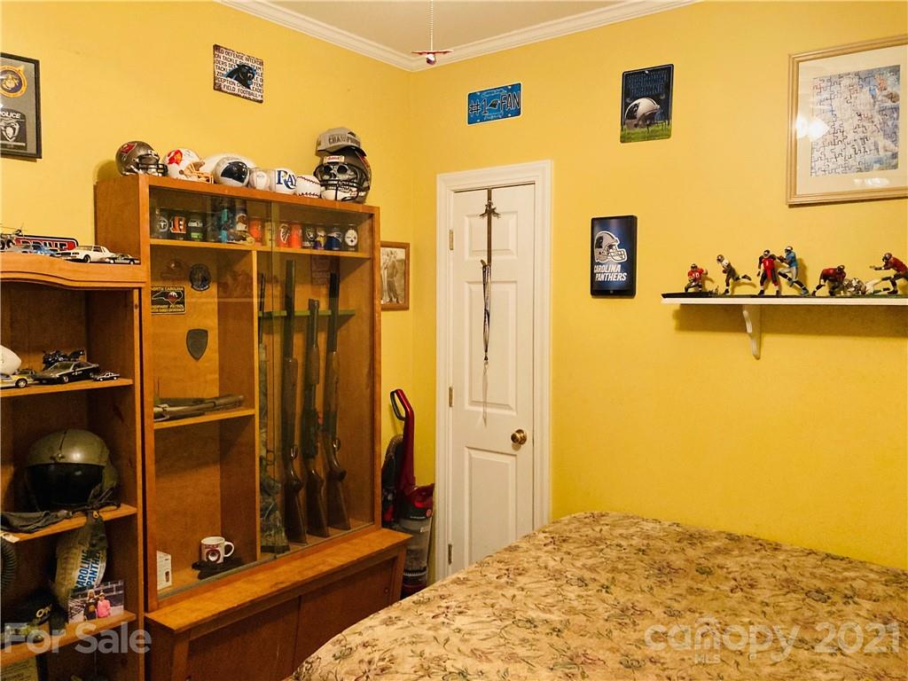 470 Duncard Church Road Rutherfordton, NC 28139 - Photo 23 of 43 a bedroom with a bed and a view of bathroom