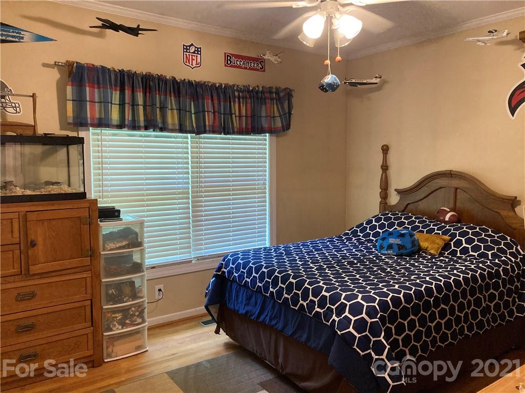 470 Duncard Church Road Rutherfordton, NC 28139 - Photo 25 of 43 a bedroom with a bed dresser and a window