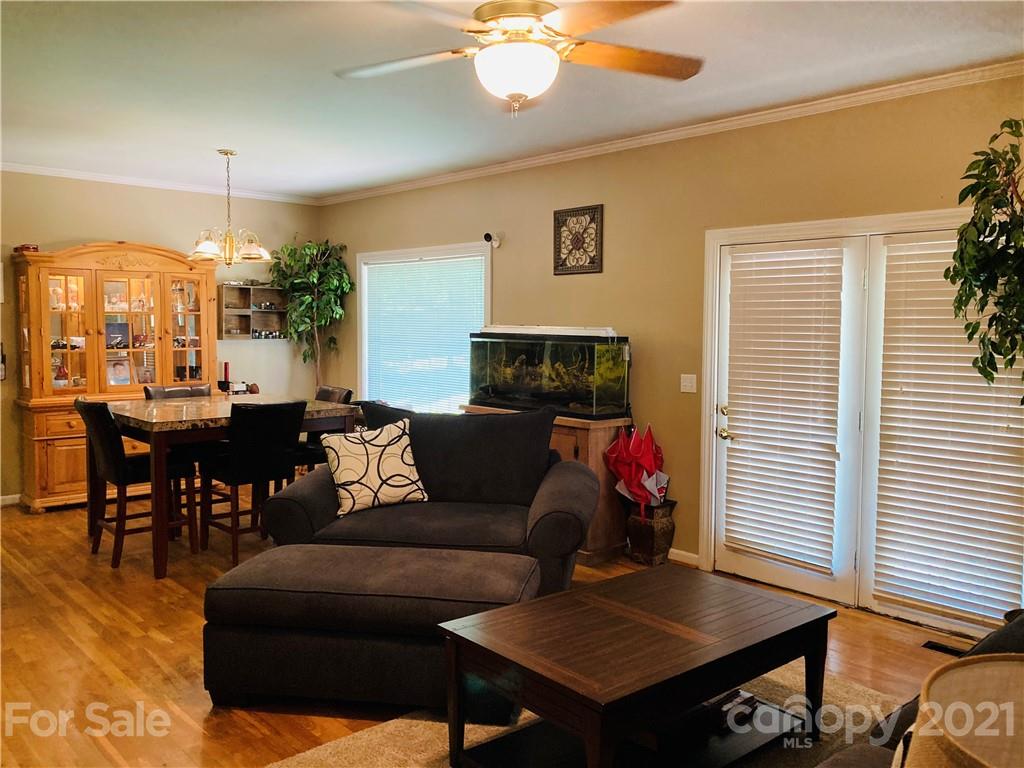 470 Duncard Church Road Rutherfordton, NC 28139 - Photo 4 of 43 a living room with furniture and a chandelier