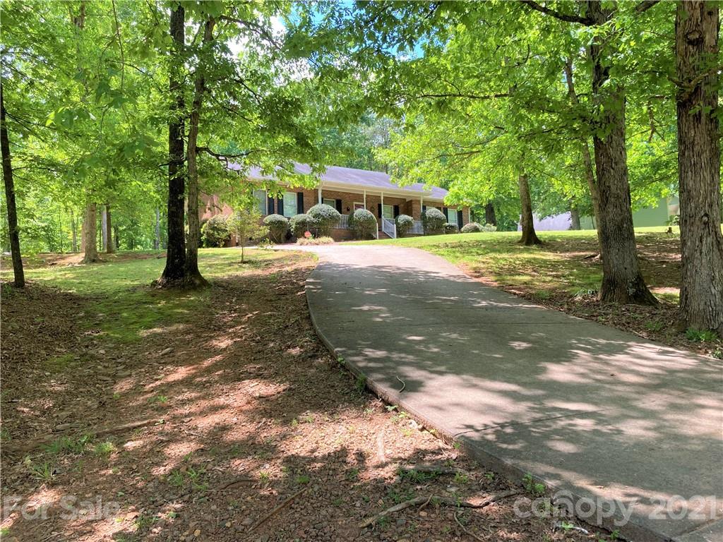 470 Duncard Church Road Rutherfordton, NC 28139 - Photo 34 of 43 a view of a yard with plants and trees
