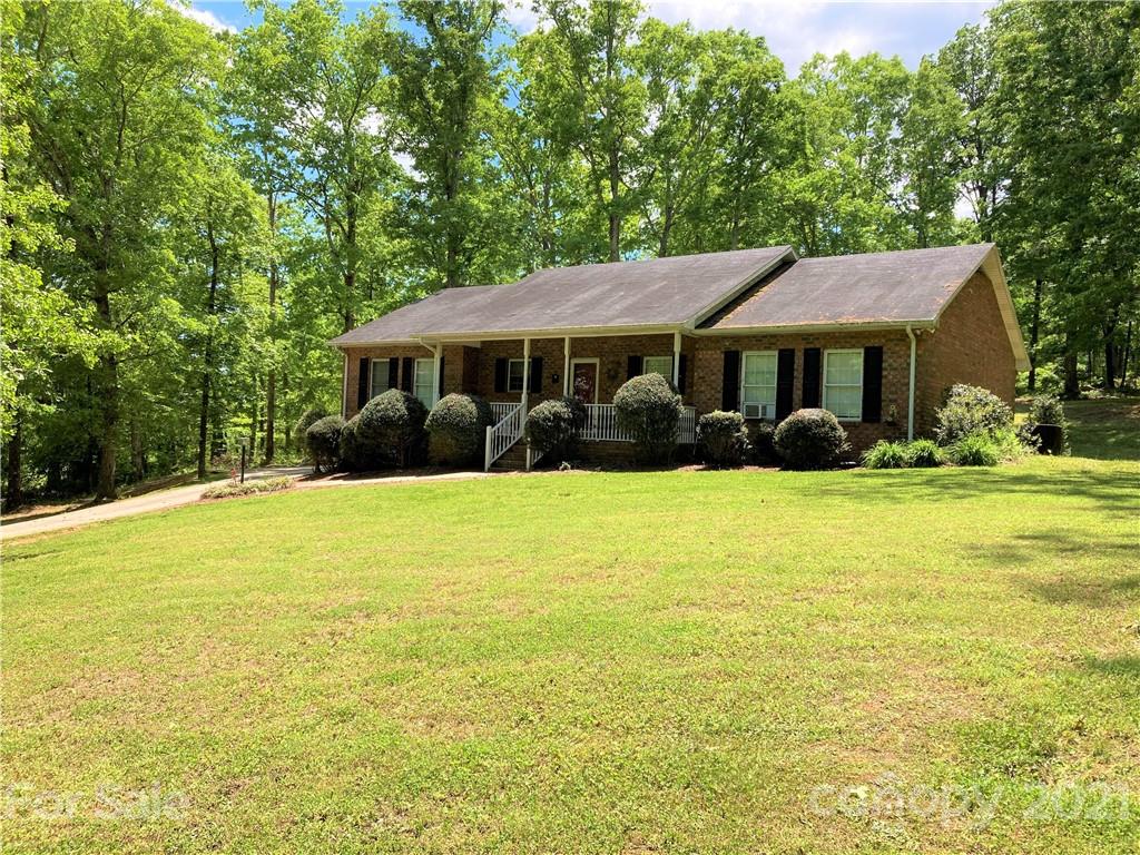 470 Duncard Church Road Rutherfordton, NC 28139 - Photo 35 of 43 a front view of house with yard and trees in the background