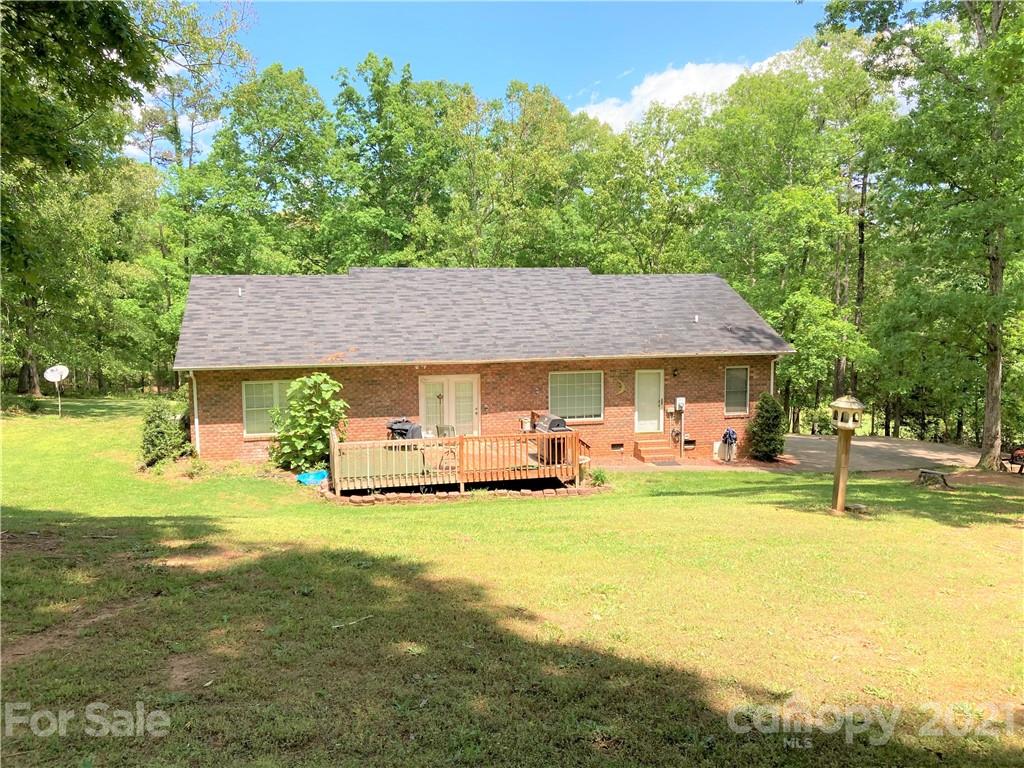 470 Duncard Church Road Rutherfordton, NC 28139 - Photo 38 of 43 a view of a house with garden and trees