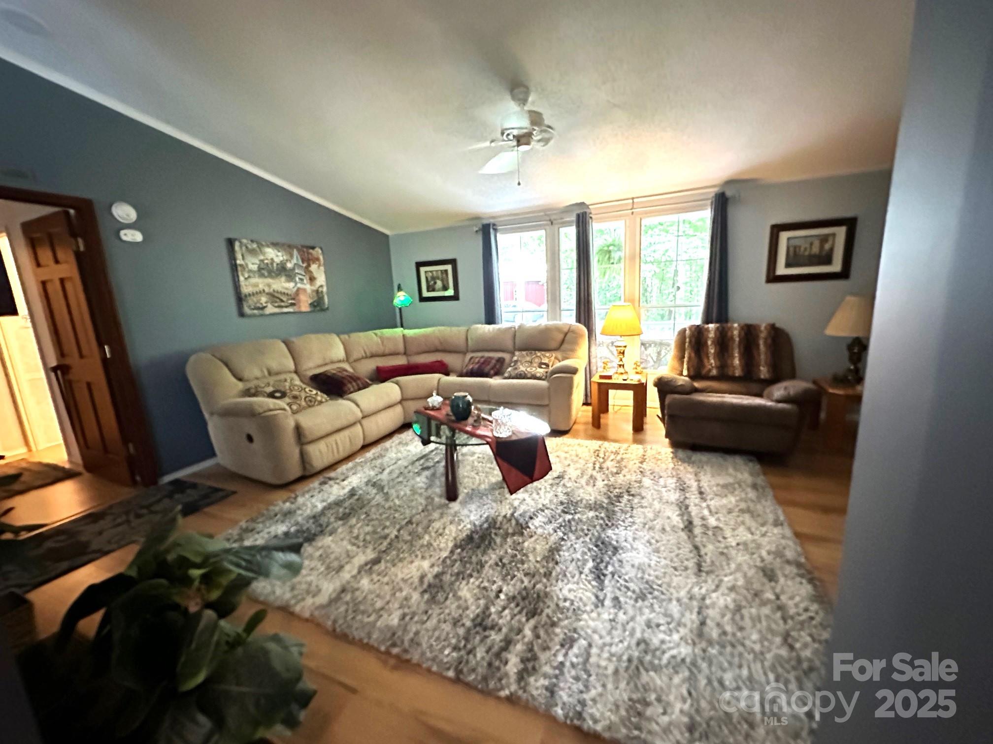 251 Rainbow Rapids Road Rutherfordton, NC 28139 - Photo 15 of 45 a living room with furniture and a window