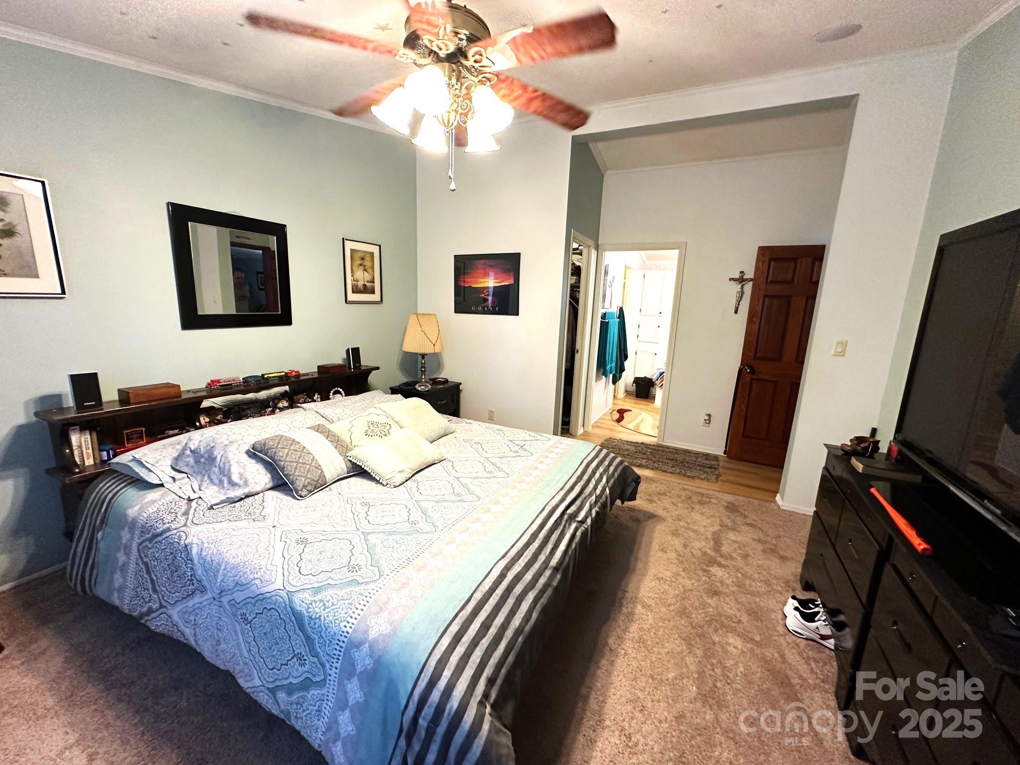 251 Rainbow Rapids Road Rutherfordton, NC 28139 - Photo 27 of 45 a bedroom with a bed and a flat tv screen on dresser