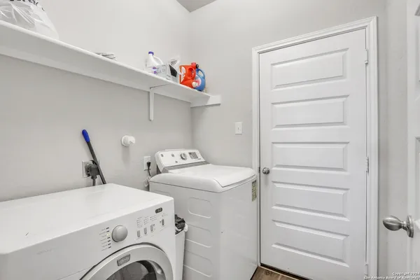 a bathroom with a sink vanity and a mirror