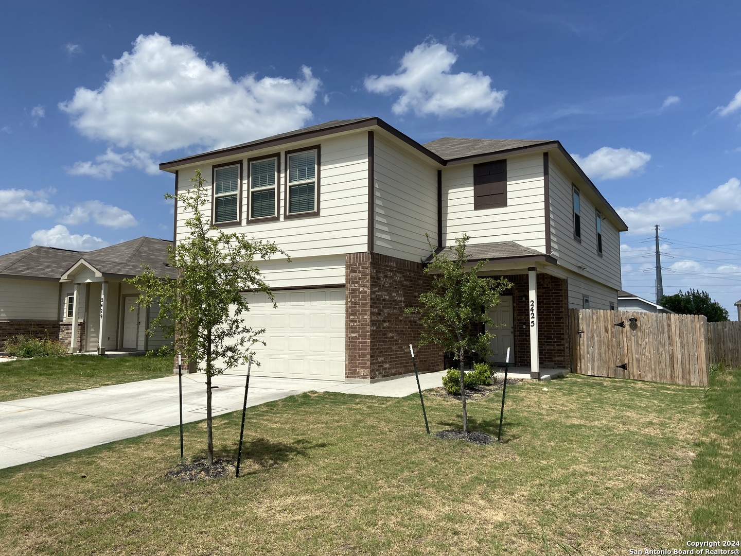 2425 Marty Way Seguin, TX 78155 - Photo 2 of 22 a backyard of a house with table and chairs