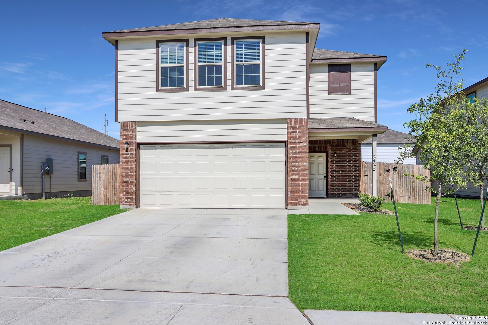 2425 Marty Way Seguin, TX 78155 - Photo 5 of 22 a front view of a house with garden