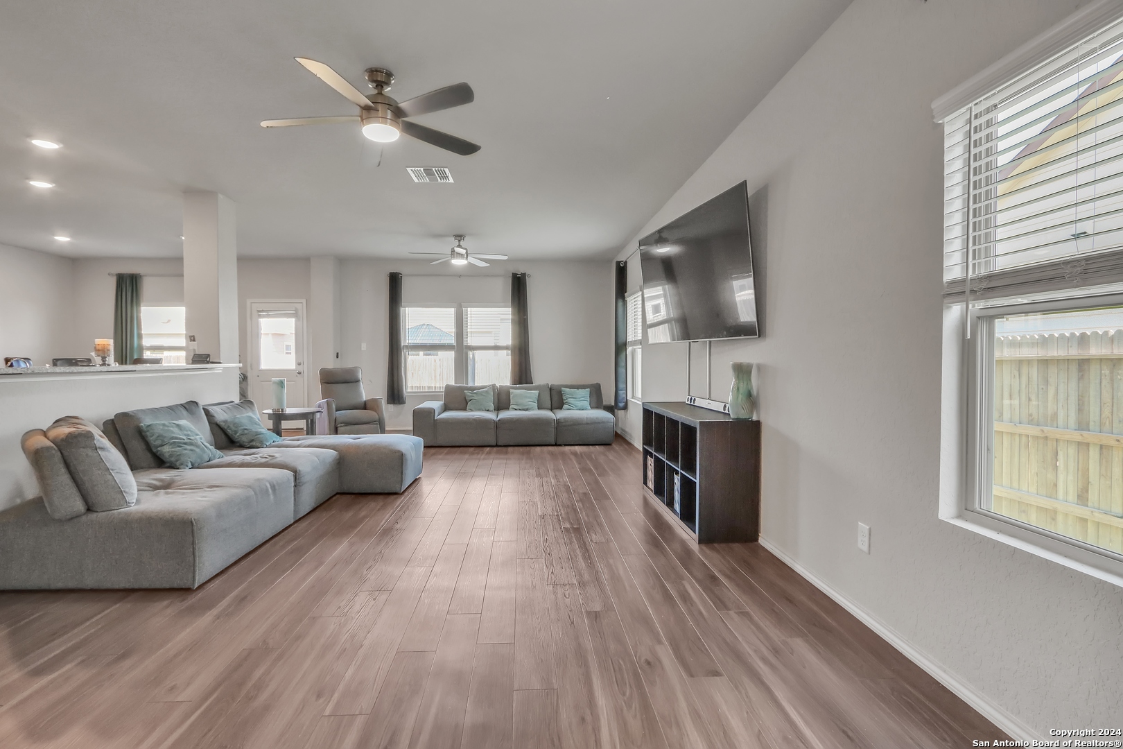 2425 Marty Way Seguin, TX 78155 - Photo 7 of 22 a living room with furniture and a fireplace