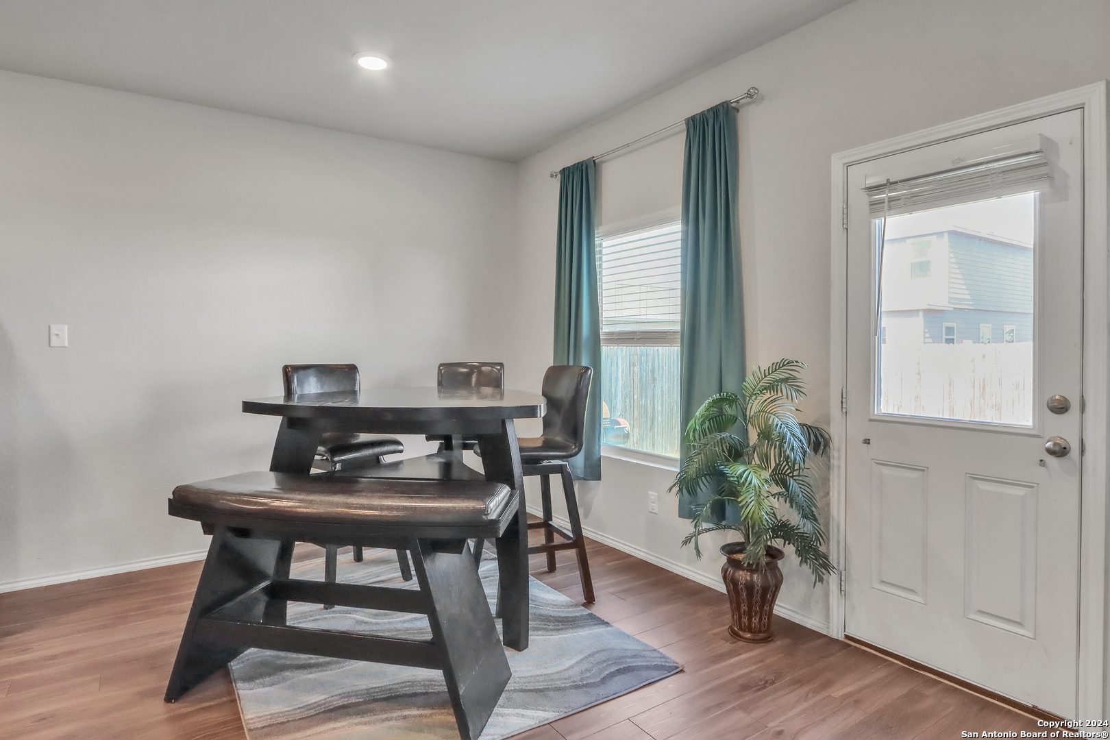 2425 Marty Way Seguin, TX 78155 - Photo 10 of 22 a dining room with furniture and wooden floor