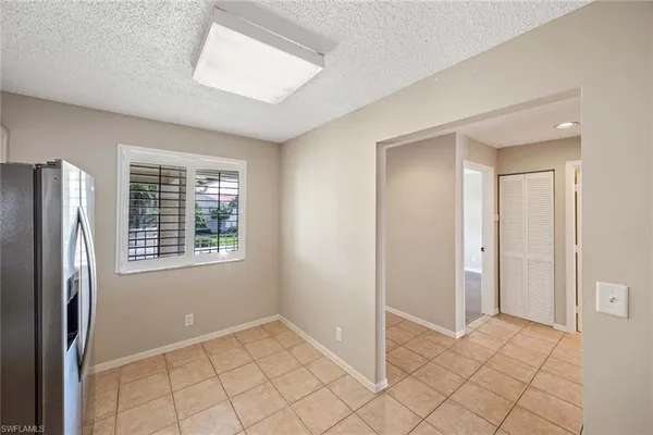 $1,650 | 7784 Emerald Circle, Unit O203, Naples, FL 34109