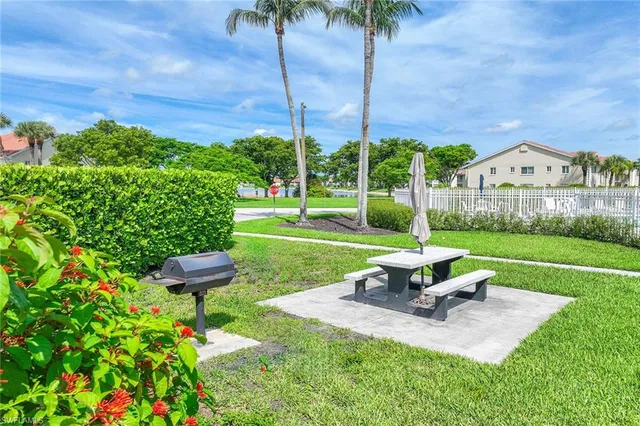 a garden view with a sitting space
