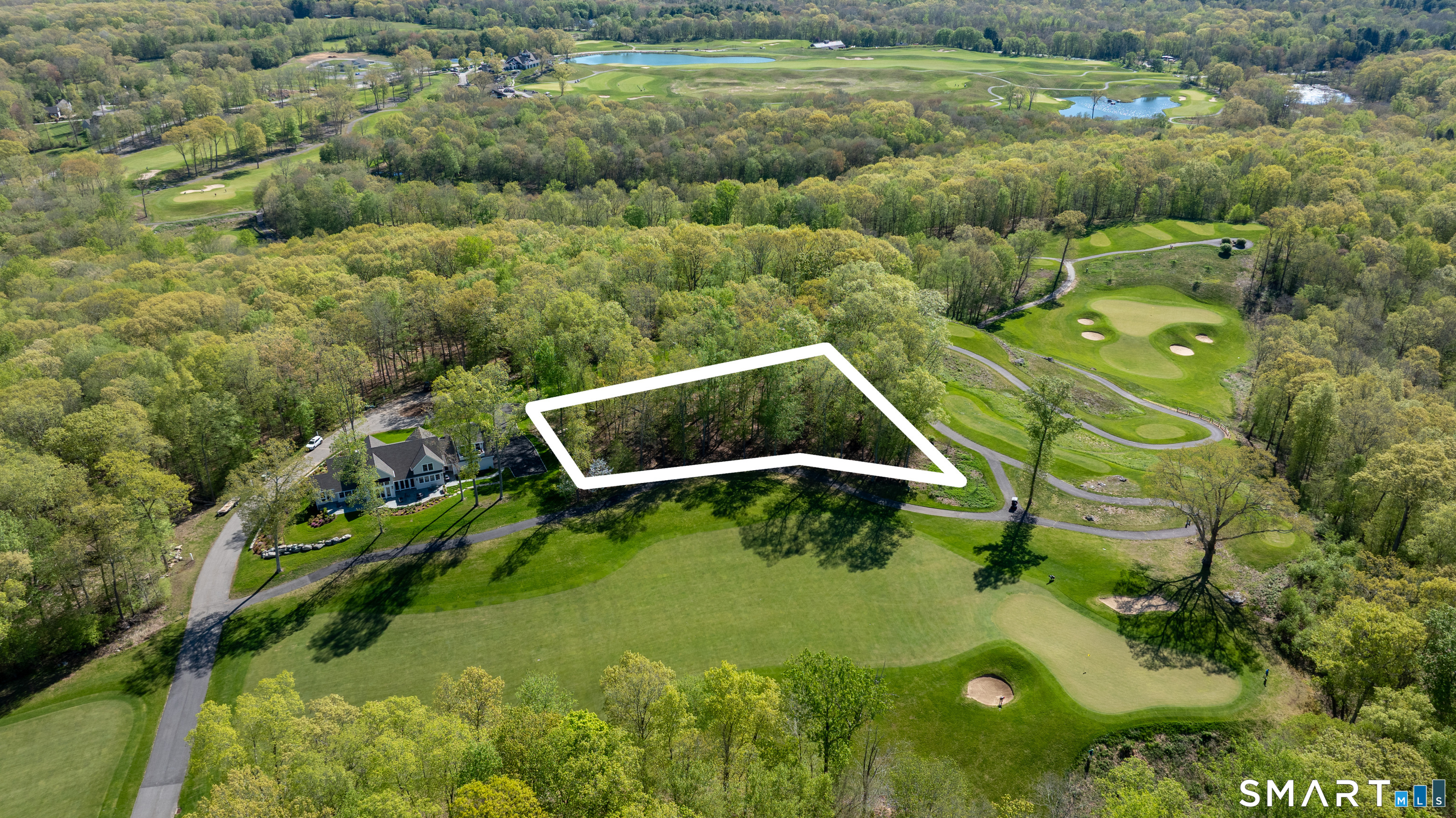 702 Fox Hopyard Road East Haddam, CT 06423 - Photo 8 of 12 an aerial view of a residential houses with outdoor space and street view