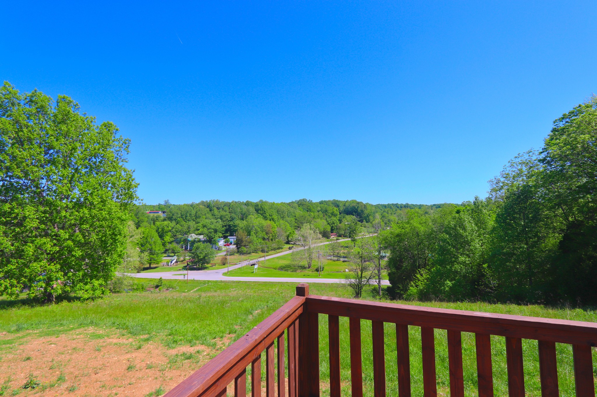 512 Highland Park Road Red Boiling Springs, TN 37150 - Photo 16 of 18 a view of a green field with sitting area