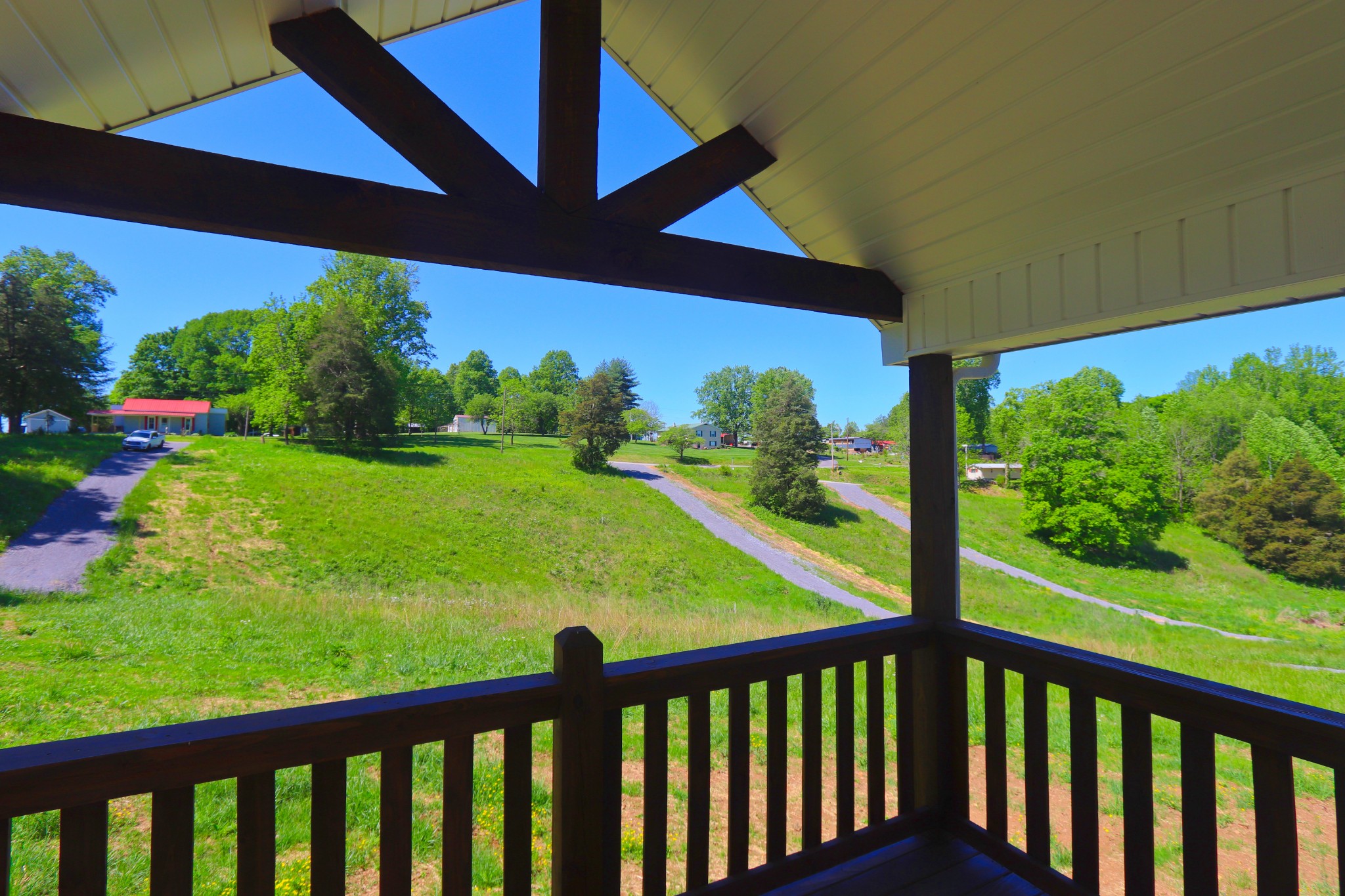 512 Highland Park Road Red Boiling Springs, TN 37150 - Photo 18 of 18 a view of a porch and garden