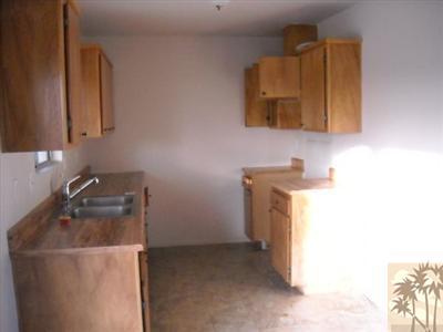 61767 Morningside Road Joshua Tree, CA 92252 - Photo 3 of 5 a utility room with a sink a washer and dryer