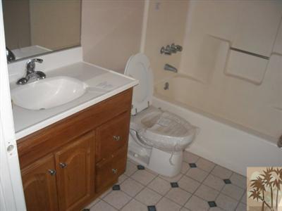 61767 Morningside Road Joshua Tree, CA 92252 - Photo 4 of 5 a bathroom with a sink toilet and vanity