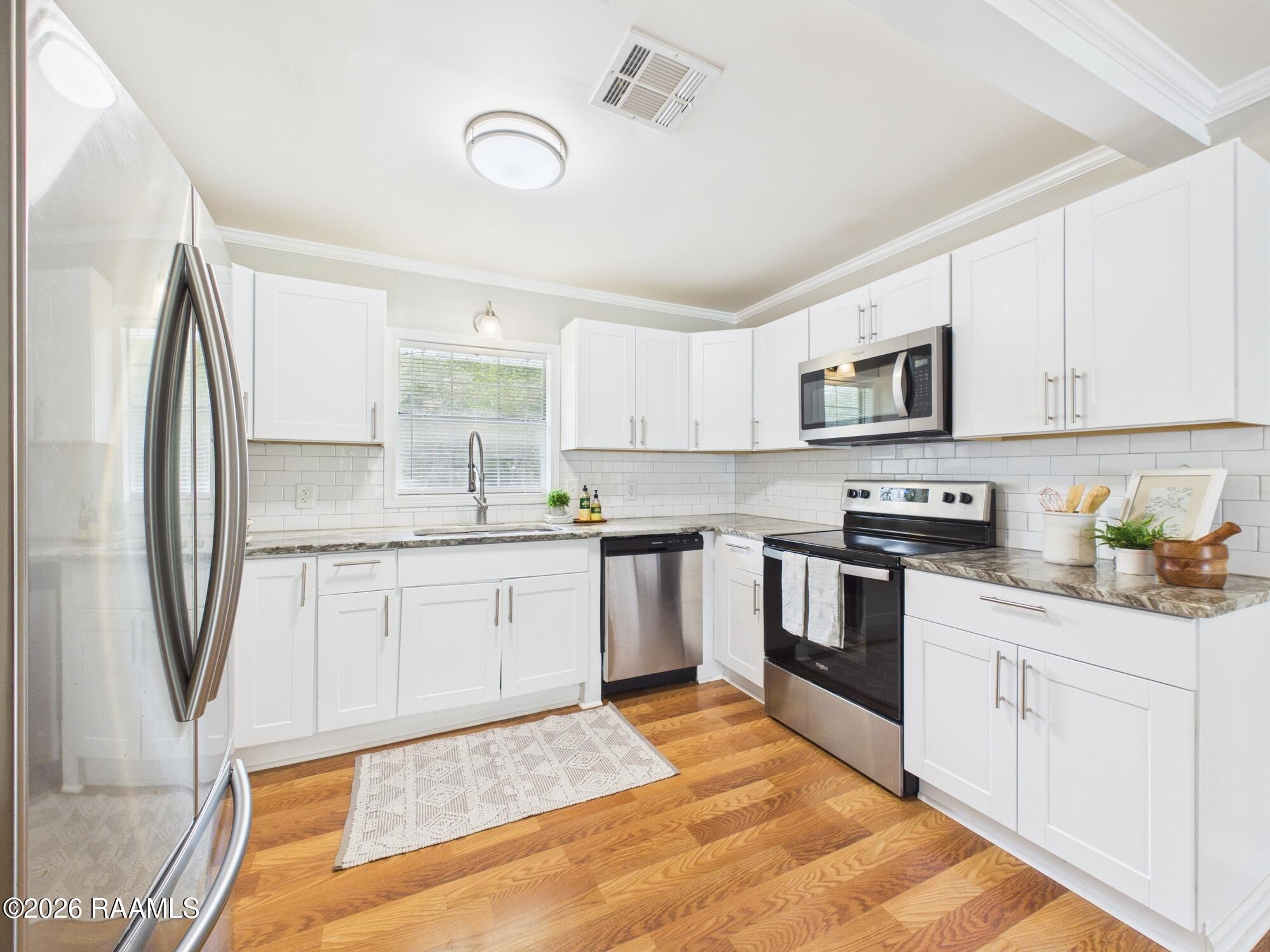 6235 Woodlawn Road Maurice, LA 70555 - Photo 10 of 40 CAM06261G6-PR0048-STILL010