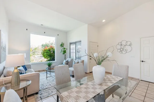 a living room with patio furniture