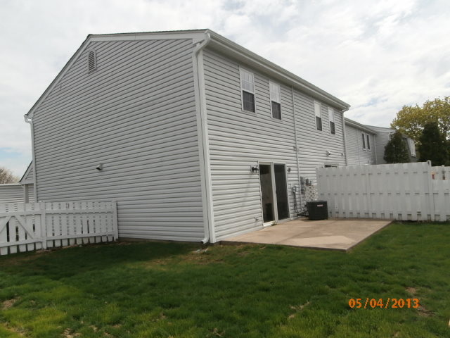 334 Rodenburg Road Roselle, IL 60172 - Photo 2 of 14 a view of a backyard with a garden