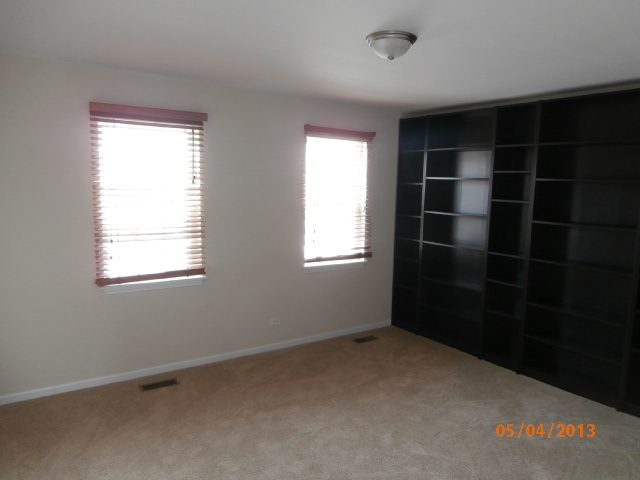 334 Rodenburg Road Roselle, IL 60172 - Photo 12 of 14 a view of empty room with a window